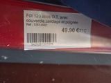 a label on the back of a red car