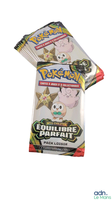 two packs of pokemon trading cards sitting on top of each other
