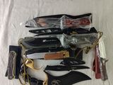 a lot of different types of knives on the table