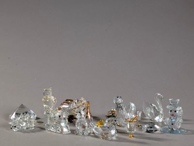 a lot of glass figurines sitting on a table