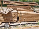 many pieces of wood stacked on top of each other
