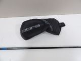 pair of ski poles and mitts sitting on a white surface