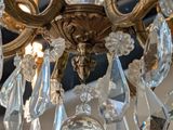 a chandelier that has a lot of crystals hanging from it