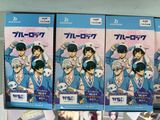 three anime books are stacked on top of each other on a shelf
