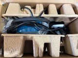 a cardboard box with a bunch of items inside of it