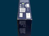 a box of toothbrushes sitting on a blue surface