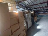 a room with a lot of boxes on the floor