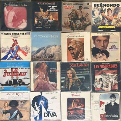 many different movie posters on the wall of a room