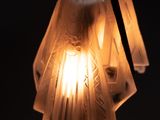 a lamp that is lit up on a table
