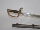 a sword that is on display on a table