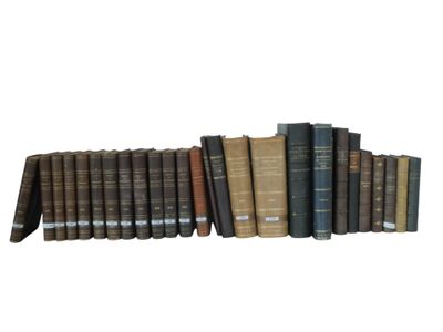 a group of books sitting on top of each other on a shelf