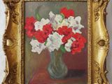 painting of red and white flowers in a vase on a table
