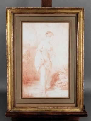 une vieille photo d'une femme debout dans un champ avec un chien