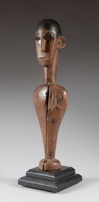 an image of a wooden sculpture of a man ' s head