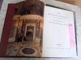 an open book with a picture of a building on it