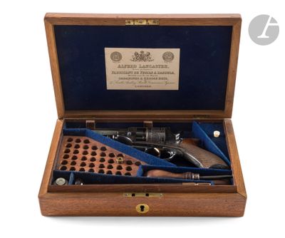 an old gun in a wooden case on a white background