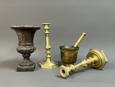 several different types of brass objects are displayed on a gray surface