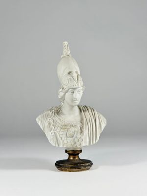 a white marble bust of a woman with a crown on her head