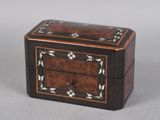 an image of a small wooden box sitting on top of a table