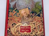 un vieux livre sur lequel figure l'image d'un homme tenant un globe terrestre