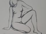 un dessin représentant un nu féminin assis par terre