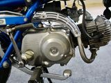 a close up of a motorcycle engine on display