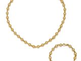 a gold beaded necklace and bracelet set on a white background