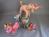 a group of toy animals that are on a table
