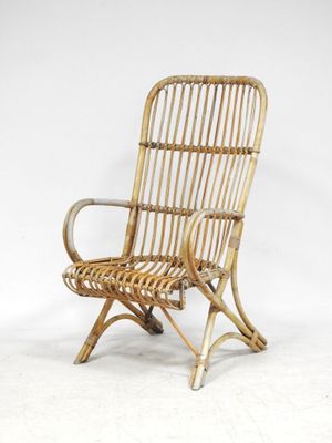 an image of a wicker chair on a white background