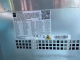 a label on the back of a machine that has a barcode on it