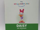 Figurine Disney de Daisy l'oie, aux cheveux roses et à la robe violette