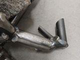 a metal object that is laying on the ground