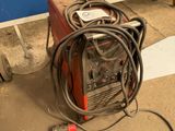 an image of a welding machine on the ground