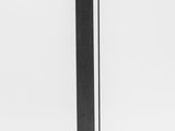 a close up of a black metal pole with a light on it