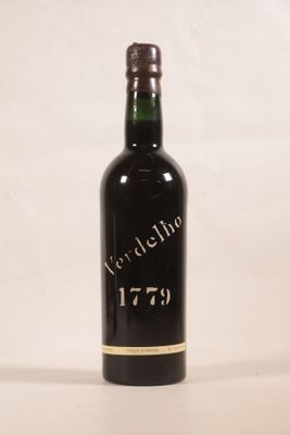 a bottle of wine that is sitting on a table