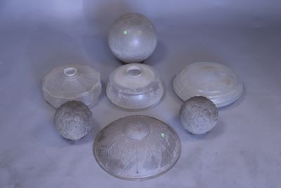 a group of glass objects sitting on a table
