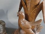 two decorative objects that are sitting on a table
