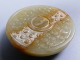 a picture of a carved soap dish on a table
