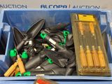 many different types of tools in a blue container