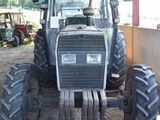 a tractor that is parked in a garage