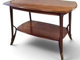 an image of a wooden table with a shelf underneath it