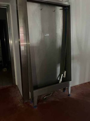an image of a large stainless steel refrigerator in a room