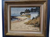 framed oil painting of a beach scene with people on the sand