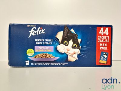 a box of felix cat food sitting on a table