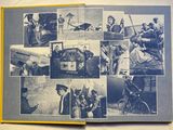 an open book with pictures of people in military uniforms