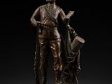 a bronze statue of a man with a dog on a pedestal