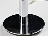 a picture of a vase with flowers in it on a stand