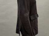 an image of a mannequin wearing a black jacket and pants