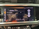 a picture of a car ' s dashboard with a digital display