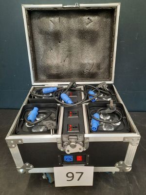 a metal case with four different types of equipment inside of it